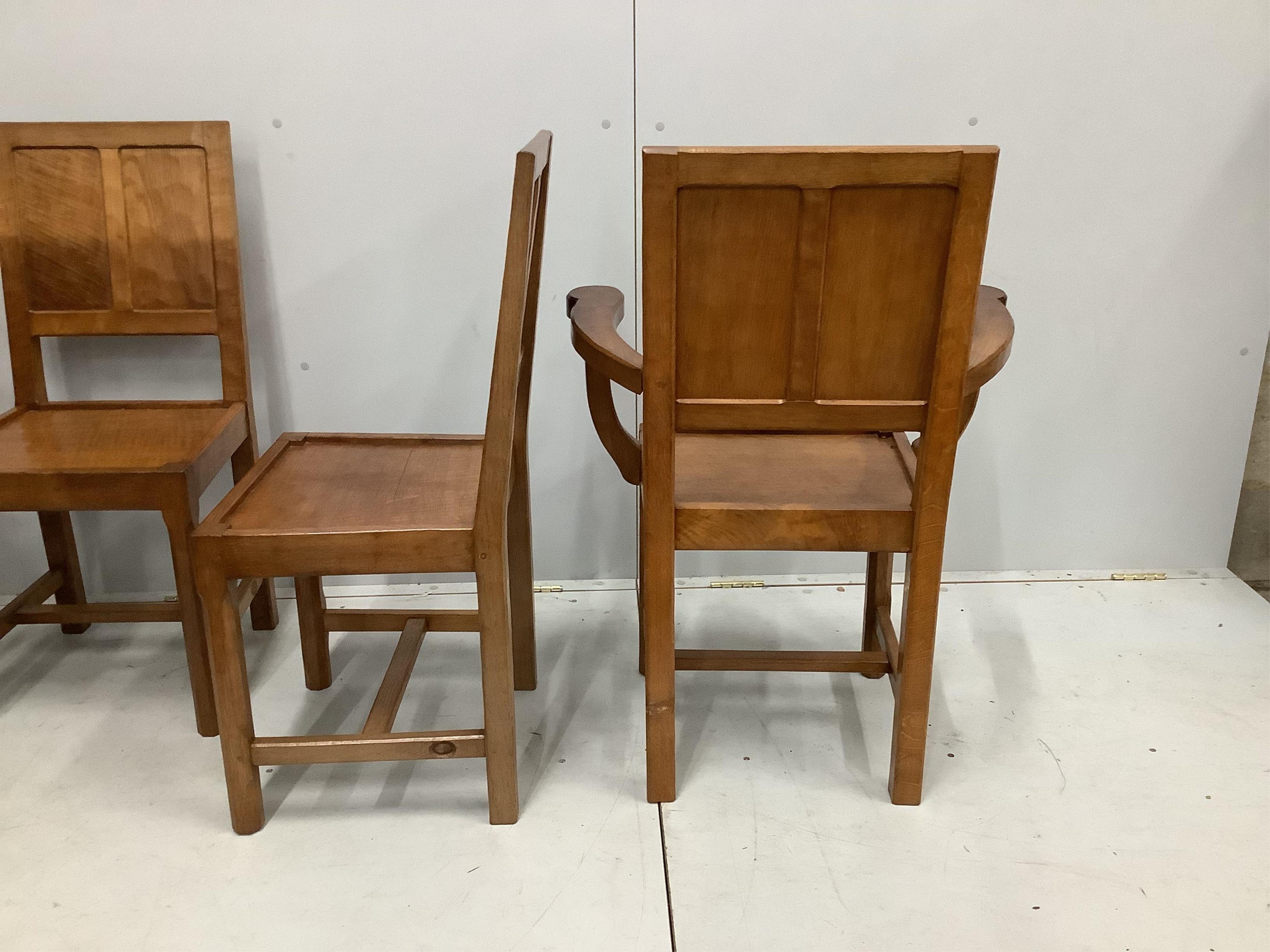 Alan Grainger 'Acorn Man', a set of six adzed oak panelled dining chairs, two with arms, largest width 66cm, depth 42cm, height 91cm. Condition - good